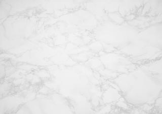 close up image of white marble floor